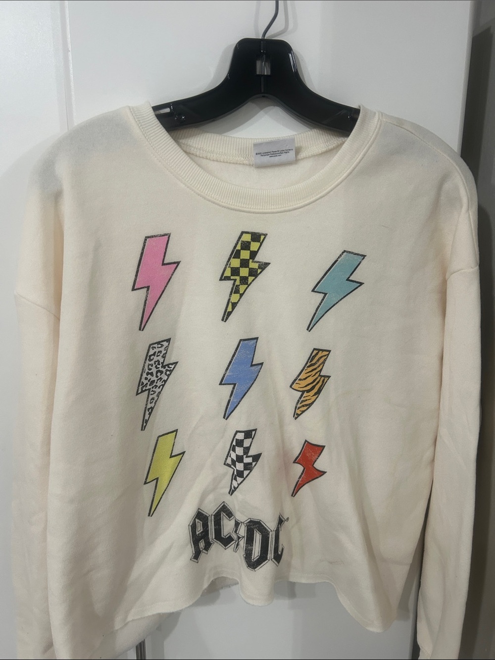 AC/DC Cream Sweatshirt with Pink, Yellow, Blue and Multicolor Bolts small